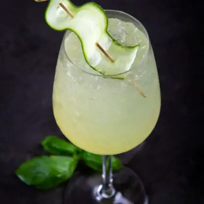 Al Fresco Spritz Cocktail With St-Germain Gin Lime Juice Prosecco Sparkling Water And Cucumbers