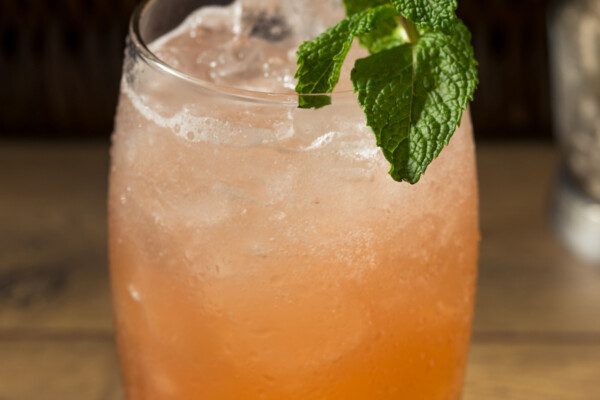 12 Crowd Pleasing Punch Recipes For Your Summer Cookout &Mdash; The Shaken Cocktail Refreshing Sweet Planters Punch Tiki Cocktail