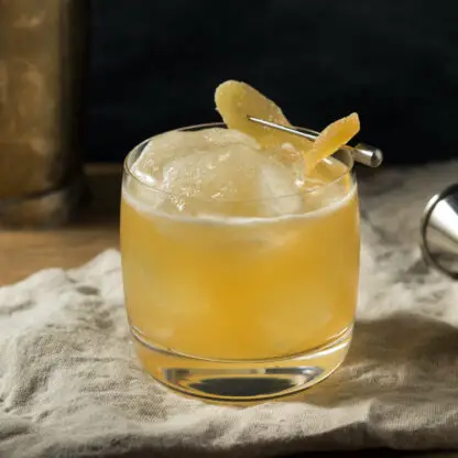 Mountain Man Cocktail With Bourbon Peche De Vigne Lemon Juice Maple Syrup And Ginger Syrup