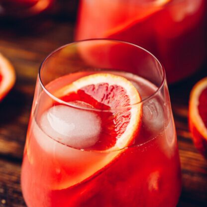 Yellowbelly Wine Punch With Aperol Amaro, Gin, Lemon Juice, Grapefruit Juice, And Champagne