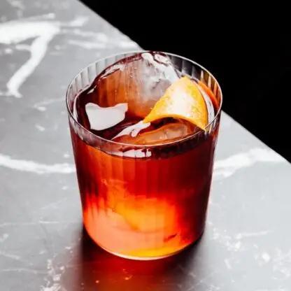 Spicy Negroni With Mezcal Sweet Vermouth Campari Amaro Ancho Reyes Chile Liqueur And Habenero Bitters