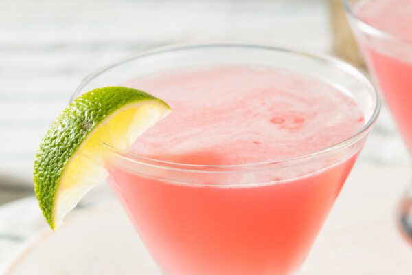 Types Of Orange Liqueur And How To Use Them &Mdash; The Shaken Cocktail Boozy Refreshing Cranberry Cosmopolitan Cocktail With Lime Garnish