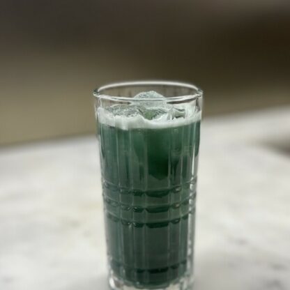 Enlightened Oasis With Dark Rum Blue Spirulina Allspice Dram Pineapple Juice And Passion Fruit Syrup
