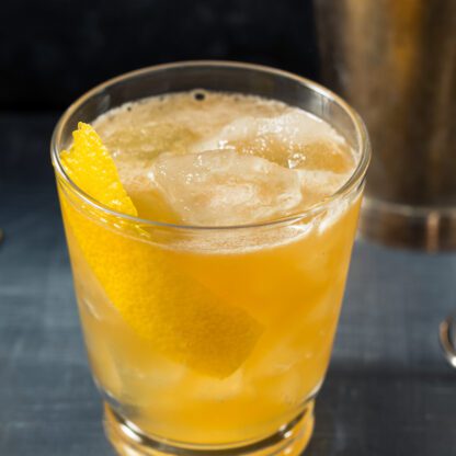 The Healer Cocktail With Bourbon Whiskey, Gentian Liqueur Suze, Amaro Nonino, Licor 43 Vanilla Liqueur, And Lemon Juice
